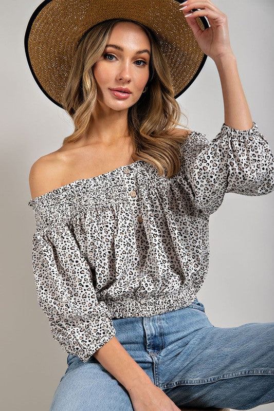 ANIMAL PRINT SMOCKED OFF THE SHOULDER TOP